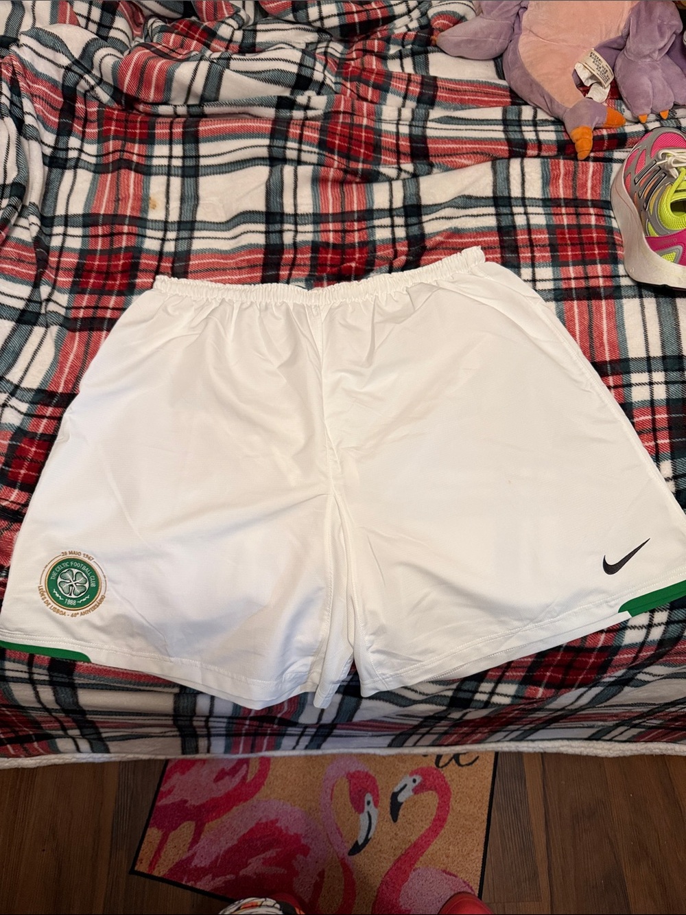 Nike White Soccer Shorts with Green Crest and Black Swoosh